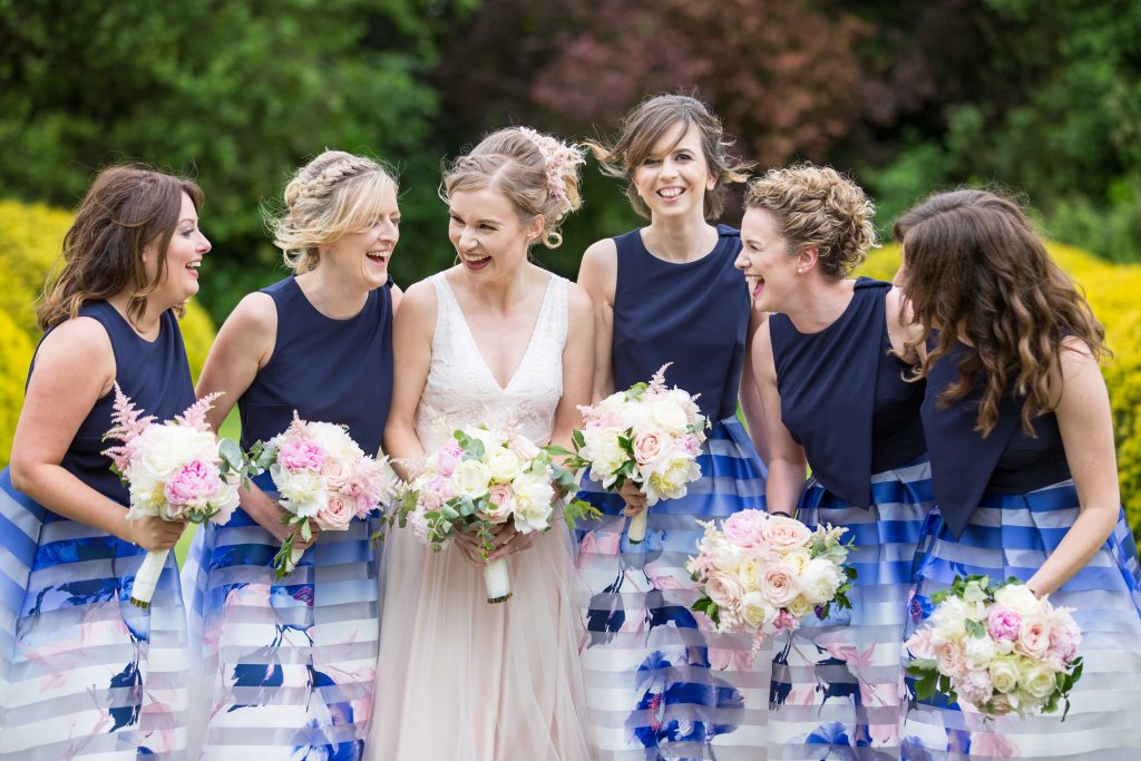 Bride & Bridesmaids laughing